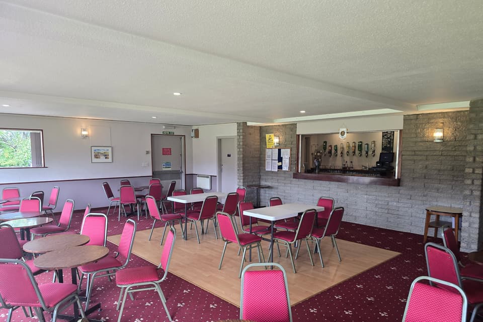 Main hall seating area with bar hatch