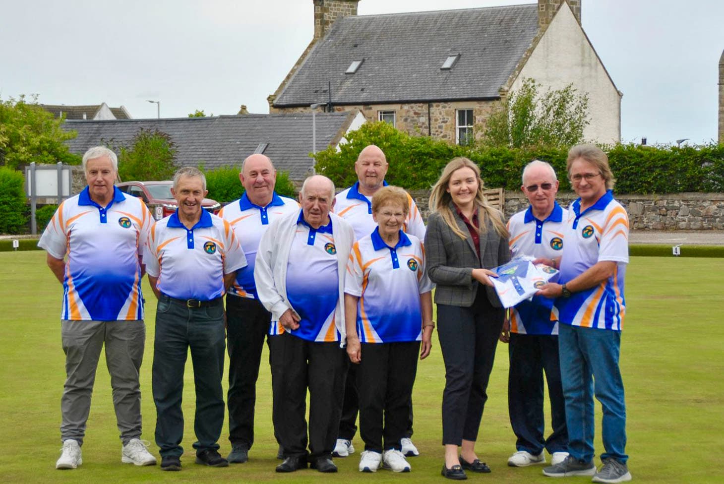 Cullen Bowling Club members in club shirts on the green